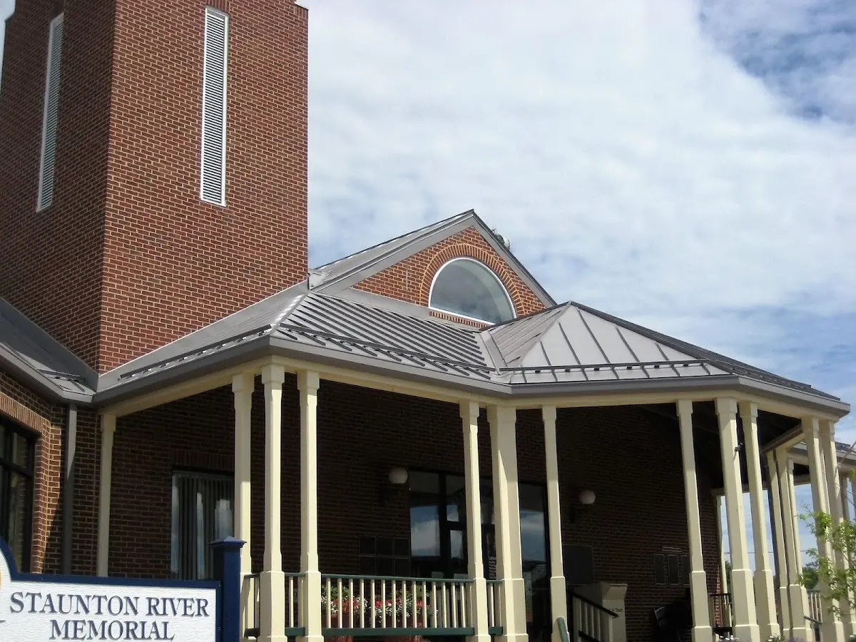 Skilled roofing craftsmen working on a residential roof in Flower Hill